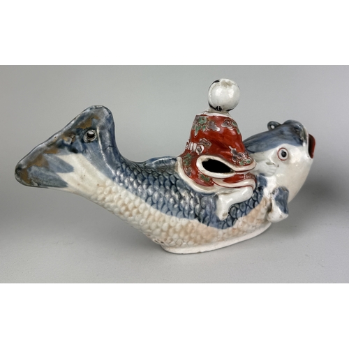 319 - A JAPANESE ARITA STYLE BOY RIDING A CARP ALONG WITH A BLUE GLAZED CERAMIC BOWL, CHINESE BRUSH POT AN... 