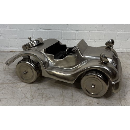 337 - A CHROME MODEL CAR
60cm x 30cm x 20cm