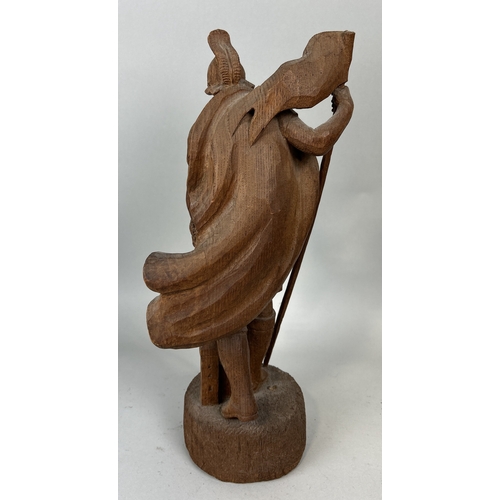 342 - A WOODEN SCULPTURE DEPICTING A SAINT
44cm H