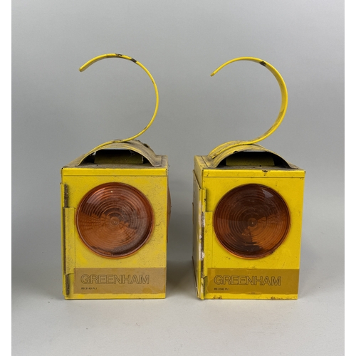 349 - A PAIR OF YELLOW INDUSTRIAL LANTERNS LABELLED 'GREENHAM'
35cm H each.