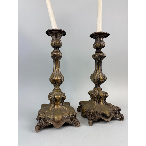 359 - A PAIR OF WMF ELECTROPLATED CANDLESTICKS
36cm H each.