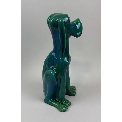 388 - AN ITALIAN GREEN GLAZED CERAMIC DOG WITH CERAMIC CAT
 
34 cm H