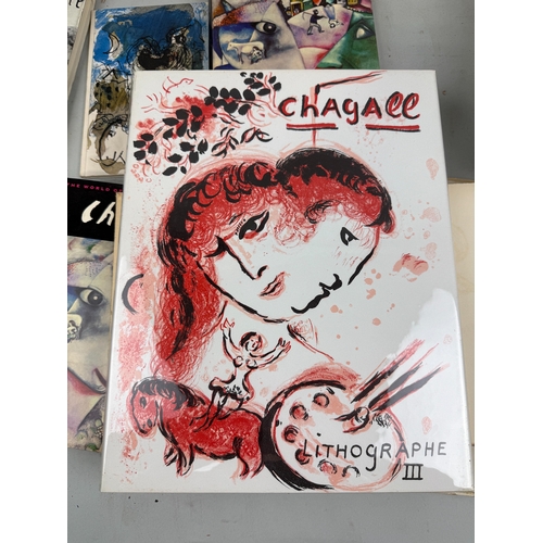 457 - A COLLECTION OF BOOKS ON MARC CHAGALL TO INCLUDE FOUR COPIES OF CHAGALL LITHOGRAPHIE III, RENE SCHWO... 