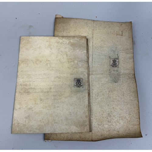 496 - TWO ROYAL DECREES ON VELLUM, FROM GEORGE II AND GEORGE III