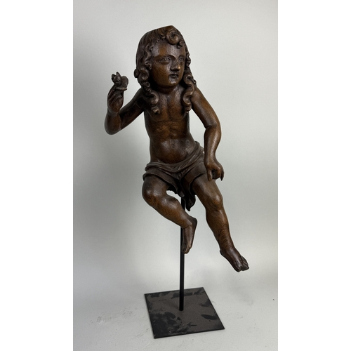 6 - A 17TH CENTURY OR EARLIER CARVED WOODEN FIGURE OF CUPID
51cm H
With stand 71cm H
Provenance: Private... 