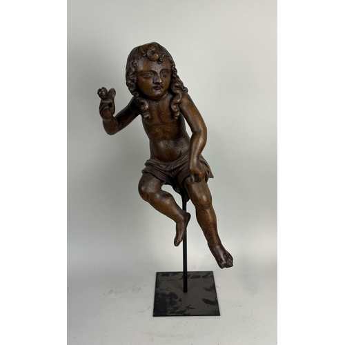 6 - A 17TH CENTURY OR EARLIER CARVED WOODEN FIGURE OF CUPID
51cm H
With stand 71cm H
Provenance: Private... 