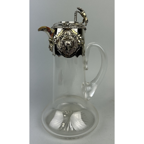 61 - A VICTORIAN SILVER MOUNTED CLARET JUG WITH FOX-HUNTING DESIGN
29cm H