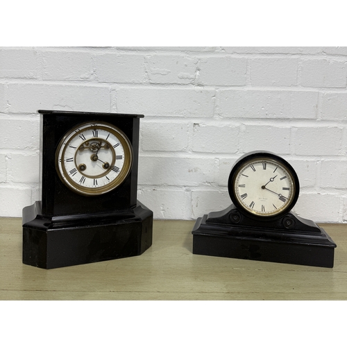 999 - TWO FRENCH EBONISED CLOCKS
 
Largest 23 x 21 cm