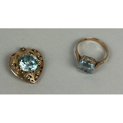 172A - A CHINESE GOLD RING WITH BLUE STONE ALONG WITH A MATCHING HEART PENDANT

Weight: 6.5gms