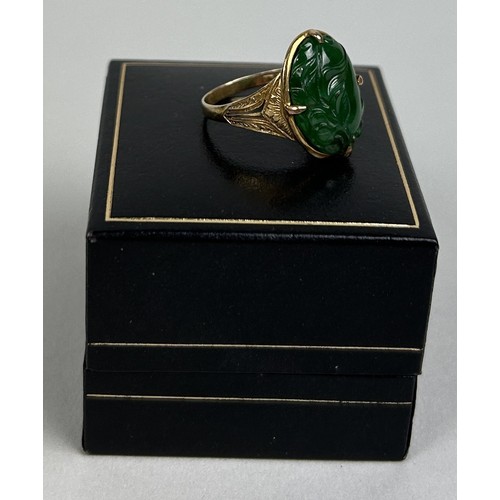 172B - A CHINESE 14CT GOLD RING SET WITH JADE BEZEL

Weight: 4.1gms