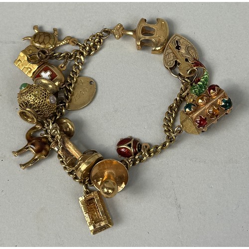 150 - AN 18CT GOLD CHARM BRACELET
The charms ranging from 9ct to 18ct and possibly foreign gold or yellow ... 