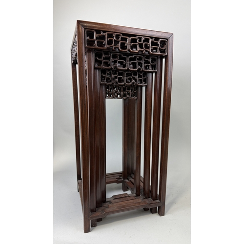 104 - AN EARLY 20TH CENTURY CHINESE WOODEN NEST OF TABLES
70cm x 32cm x 32cm