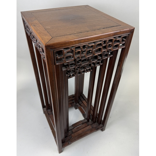 104 - AN EARLY 20TH CENTURY CHINESE WOODEN NEST OF TABLES
70cm x 32cm x 32cm