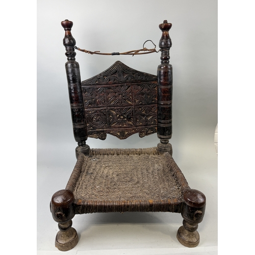 120 - AN ANTIQUE HARD WOOD PIDDHA CHAIR WITH WOVEN SEAT
79cm x 48cm x 42cm