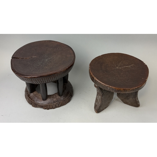 123 - TWO AFRICAN HARDWOOD MILKING STOOLS
Largest 32cm x 25cm