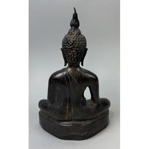 124 - A BRONZE BUDDHA
35cm x 23cm x 11cm