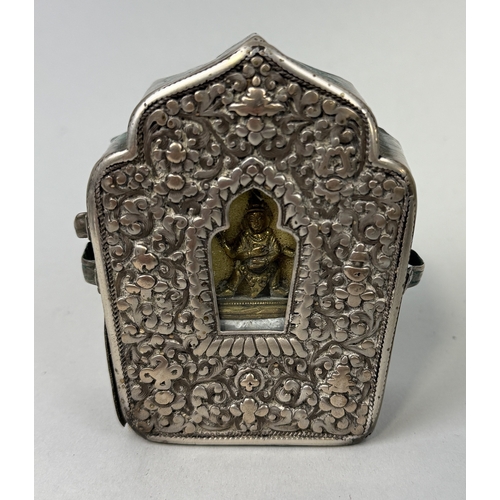 125 - A TIBETAN TALISMAN BOX WITH BRONZE BUDDHA AND PART CASE
9.5cm x 7cm x 4cm