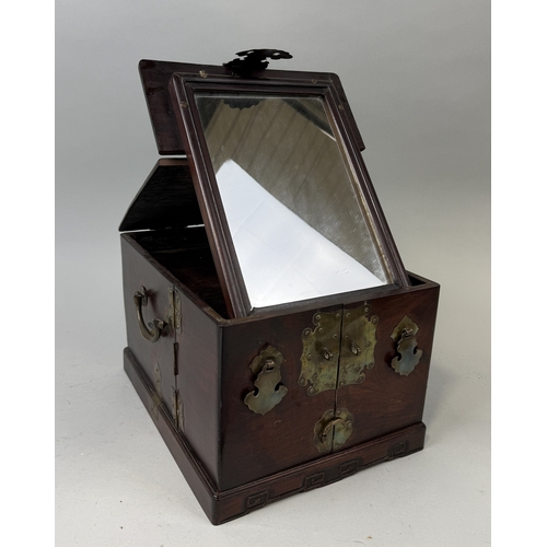 131 - A CHINESE HARD WOOD VANITY CASE WITH MIRROR
When closed 32cm x 24cm x 20cm