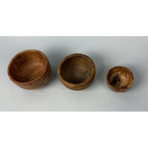 144 - THREE GRADUATED TURNED WOODEN BOWLS
Largest 13cm x 9cm