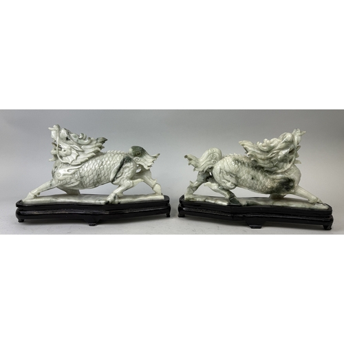 158 - A PAIR OF CHINESE JADE DRAGONS ON STANDS
Dragons 36cm x 20cm each