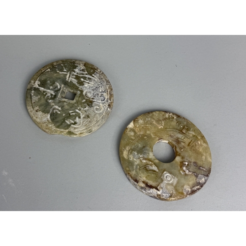 172A - A PAIR OF CHINESE JADE BI DISCS
9cm each.