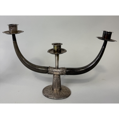 195 - A PAIR OF SILVER MOUNTED HORN CANDLESTICKS, PROBABLY SIAMESE OR THAI
29cm x 16cm each.