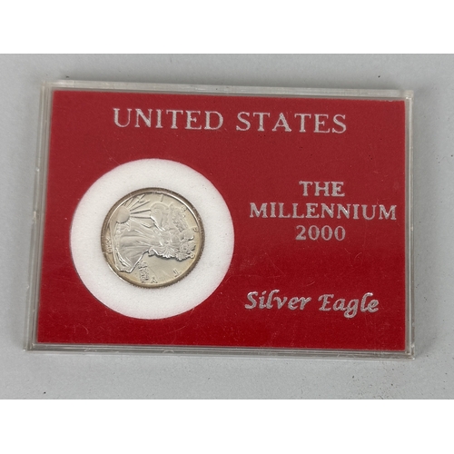 218 - A UNITED STATES THE MILLENNIUM 2000 GOLD EAGLE / SILVER EAGLE
In case