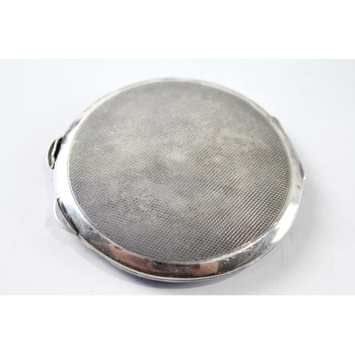 221 - A .925 STERLING SILVER ENAMEL VANITY COMPACT
Weight: 94gms