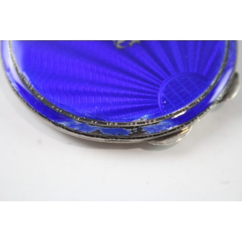 221 - A .925 STERLING SILVER ENAMEL VANITY COMPACT
Weight: 94gms