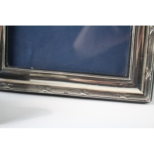 225 - A GROUP OF THREE .925 STERLING SILVER PHOTOGRAPH FRAMES