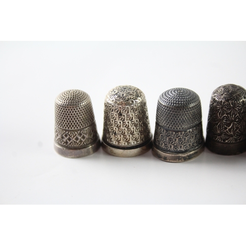 230 - A GROUP OF EIGHT .925 STERLING SILVER THIMBLES INCLUDING ANTIQUE, CHARLES HORNER
Weight: 48gms... 