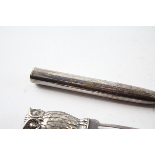 241 - FOUR 925 STERLING SILVER BOOKMARKS AND LETTER OPENER
Weight: 42gms 