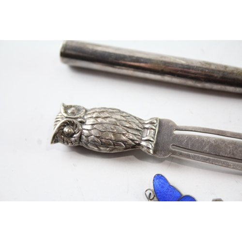 241 - FOUR 925 STERLING SILVER BOOKMARKS AND LETTER OPENER
Weight: 42gms 