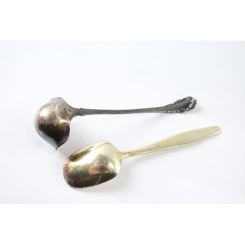 260 - TWO .925 STERLING SILVER SPOONS INCLUDING GEORG JENSEN AND J.TOSTRUP ENAMEL
Weighty: 43gms... 