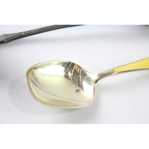 260 - TWO .925 STERLING SILVER SPOONS INCLUDING GEORG JENSEN AND J.TOSTRUP ENAMEL
Weighty: 43gms... 