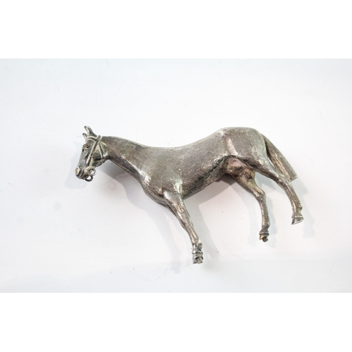 264 - A .925 STERLING SILVER NOVELTY HORSE FIGURE
Weight: 63gms