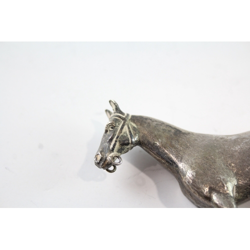 264 - A .925 STERLING SILVER NOVELTY HORSE FIGURE
Weight: 63gms