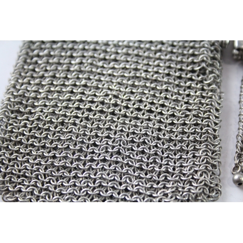 273 - TWO .925 STERLING SILVER CHAINMAIL LADIES COIN PURSES
Weight: 94gms