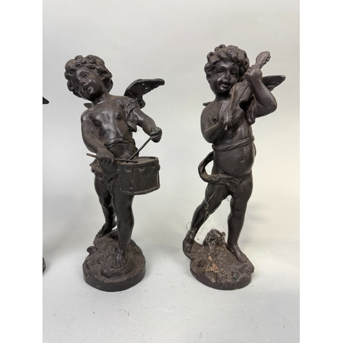 294 - A GROUP OF FOUR BRONZE PUTTI SIGNED 'MOREAU'
30cm H each.