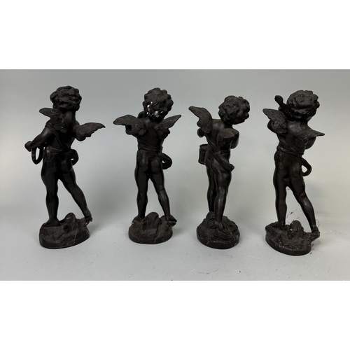 294 - A GROUP OF FOUR BRONZE PUTTI SIGNED 'MOREAU'
30cm H each.