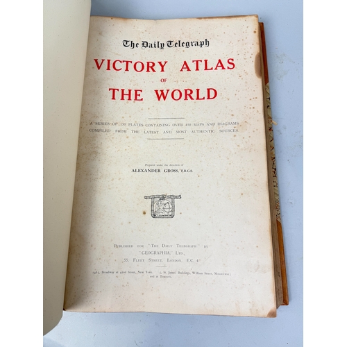 309 - VICTORY ATLAS OF THE WORLD, THE DAILY TELEGRAPH
Brown leather bound.
51cm x 34cm... 