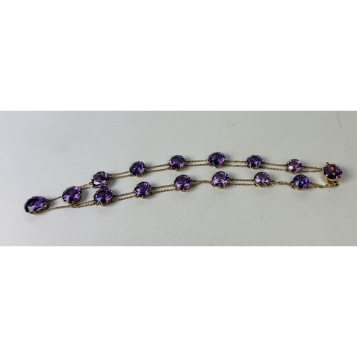 321 - AN ANTIQUE GRADUATED AMETHYST NECKLACE SET IN HIGH CARAT GOLD
Weight: 36.4gms
42cm L... 