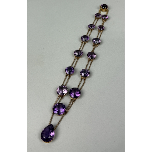 321 - AN ANTIQUE GRADUATED AMETHYST NECKLACE SET IN HIGH CARAT GOLD
Weight: 36.4gms
42cm L... 