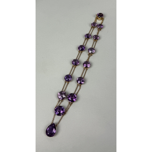 321 - AN ANTIQUE GRADUATED AMETHYST NECKLACE SET IN HIGH CARAT GOLD
Weight: 36.4gms
42cm L... 