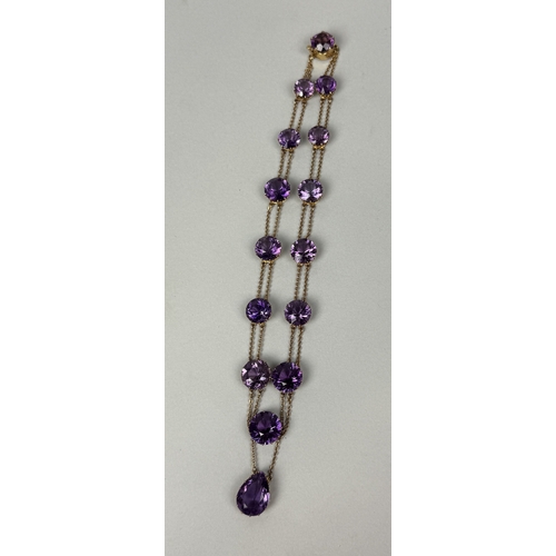 321 - AN ANTIQUE GRADUATED AMETHYST NECKLACE SET IN HIGH CARAT GOLD
Weight: 36.4gms
42cm L... 