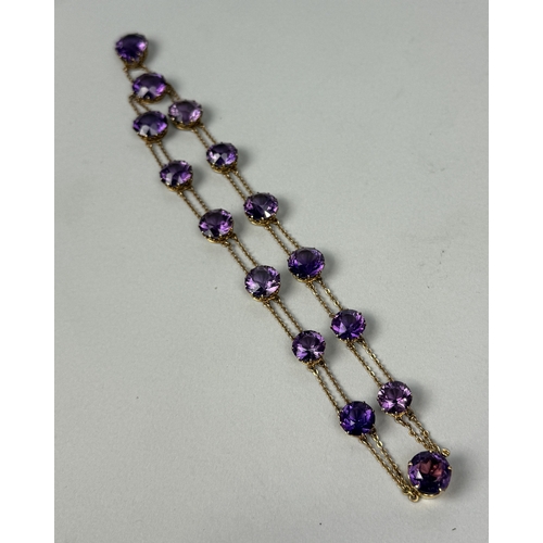 321 - AN ANTIQUE GRADUATED AMETHYST NECKLACE SET IN HIGH CARAT GOLD
Weight: 36.4gms
42cm L... 