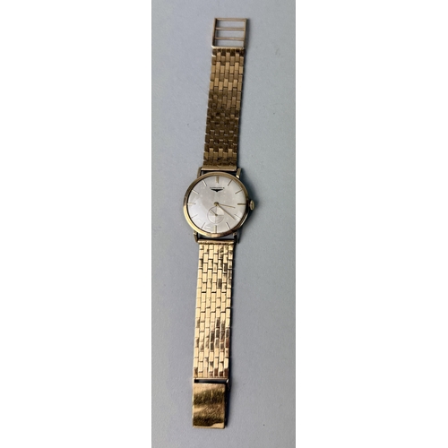 323 - A GENTLEMAN'S GOLD CASED LONGINES WRISTWATCH WITH 18CT GOLD STRAP
Total weight: 53.7gms... 