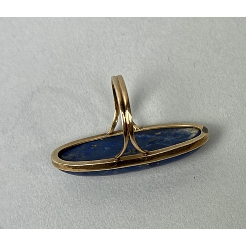 326 - A LAPIS LAZULI OVAL RING SET IN HIGH CARAT GOLD
Weight: 11.5gms