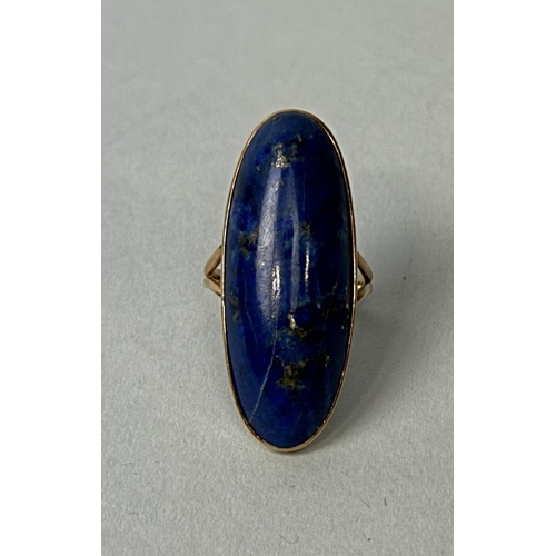 326 - A LAPIS LAZULI OVAL RING SET IN HIGH CARAT GOLD
Weight: 11.5gms