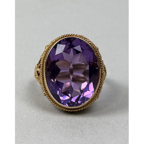 329 - AN ANTIQUE AMETHYST AND HIGH CARAT FILIGREE GOLD RING
Weight: 7.2gms